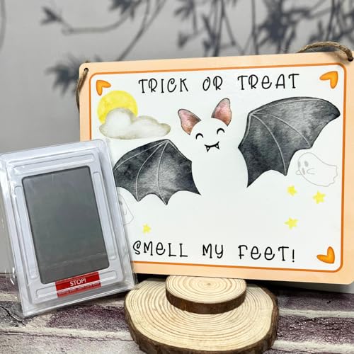 DIY Babys First Halloween Sign with Footprint Pad